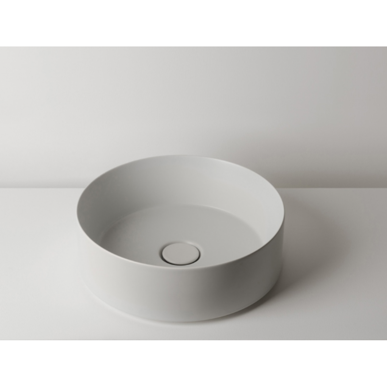 VALDAMA Track -  Ceramic countertop washbasin Ø40 h14 round